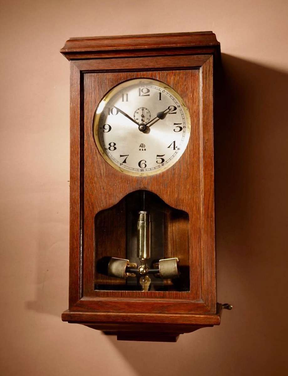  An Early Electrical Ato Haller & Benzing Oak Wall Clock Circa: 1925.