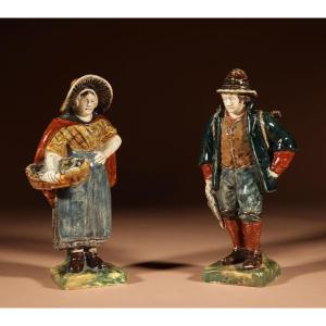 A Rare Pair Of Dutch Rozenburg Figures, Showing A Fisherman And Woman. Marked For: Rozenburg, 1