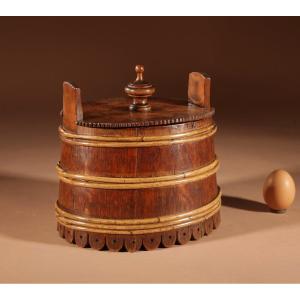 A Decorative Oval Oak Butter Tub.