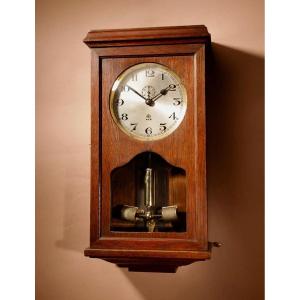  An Early Electrical Ato Haller & Benzing Oak Wall Clock Circa: 1925.