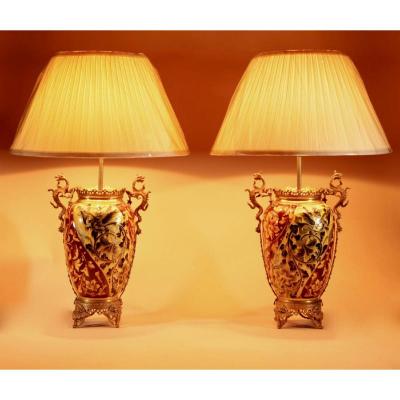 A Pair Of Spectacular And Beautiful Ceramic Hand Painted Paraffin Lamps.