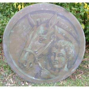 Large Circular Panel Representing A Portrait Of A Horse And A Man