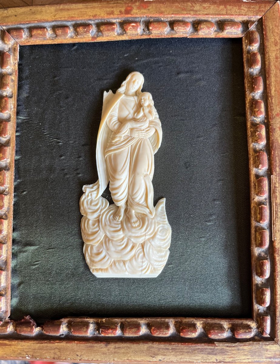 Virgin And Child In Ivory On A Cloud.xviith In A Gilded Wood Frame XVIIIth.