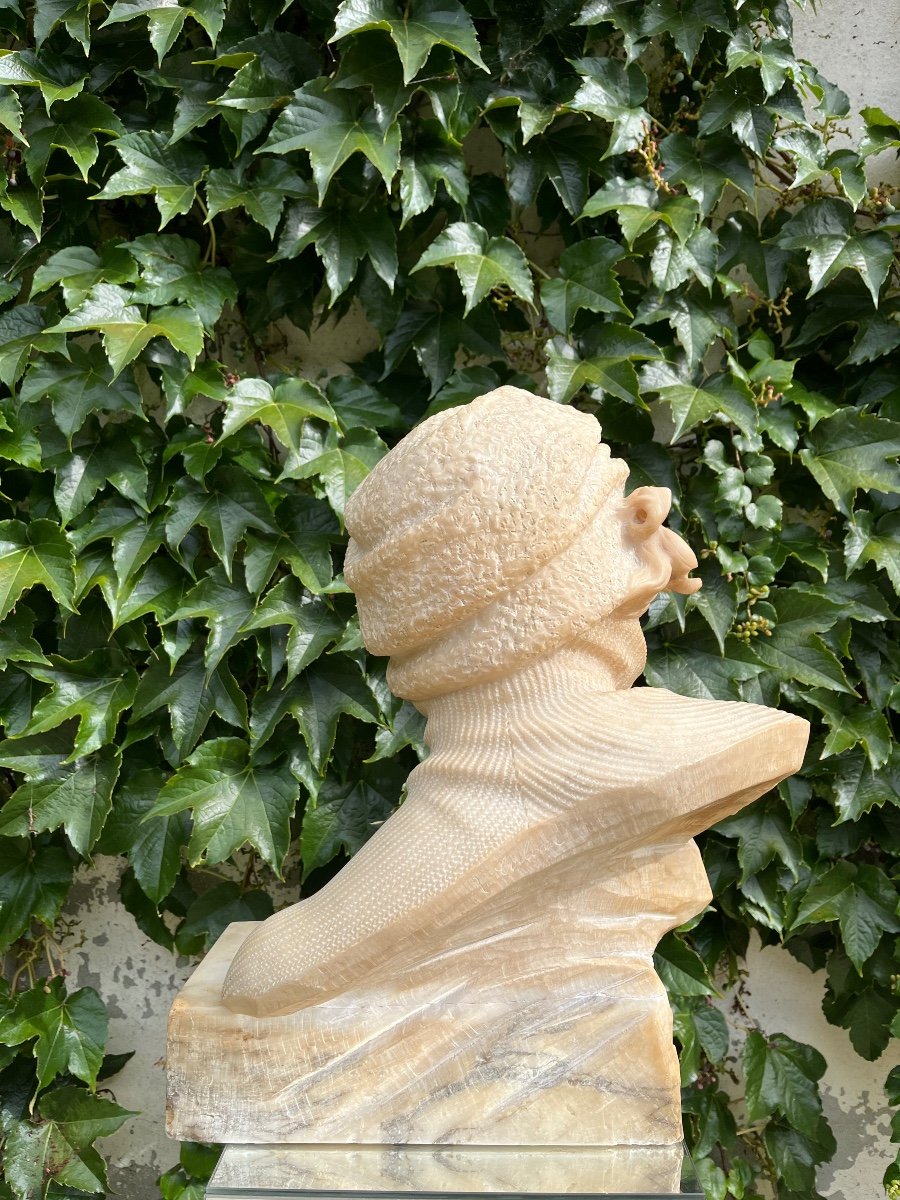 Bust Of A Woman With A Bonnet.-photo-1