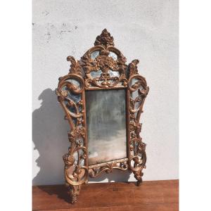 Miroir de style Louis.XV en bois doré.