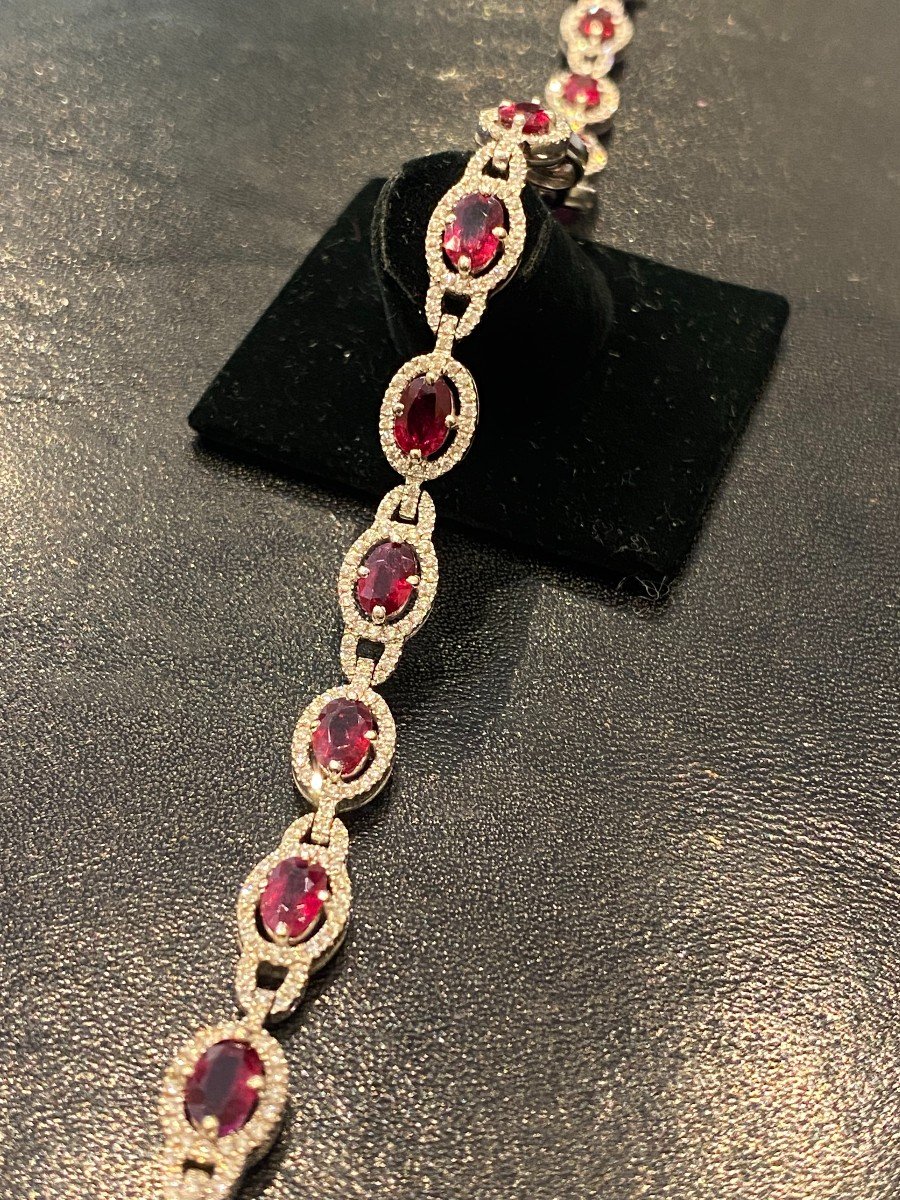 White Gold Line Bracelet Decorated With Thirteen Rubies And Diamonds