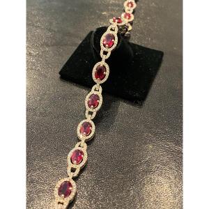 White Gold Line Bracelet Decorated With Thirteen Rubies And Diamonds