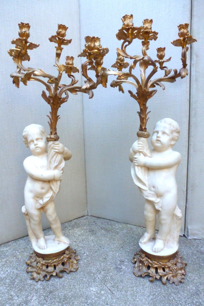 Important Pair Of Candelabra With Cherubs.