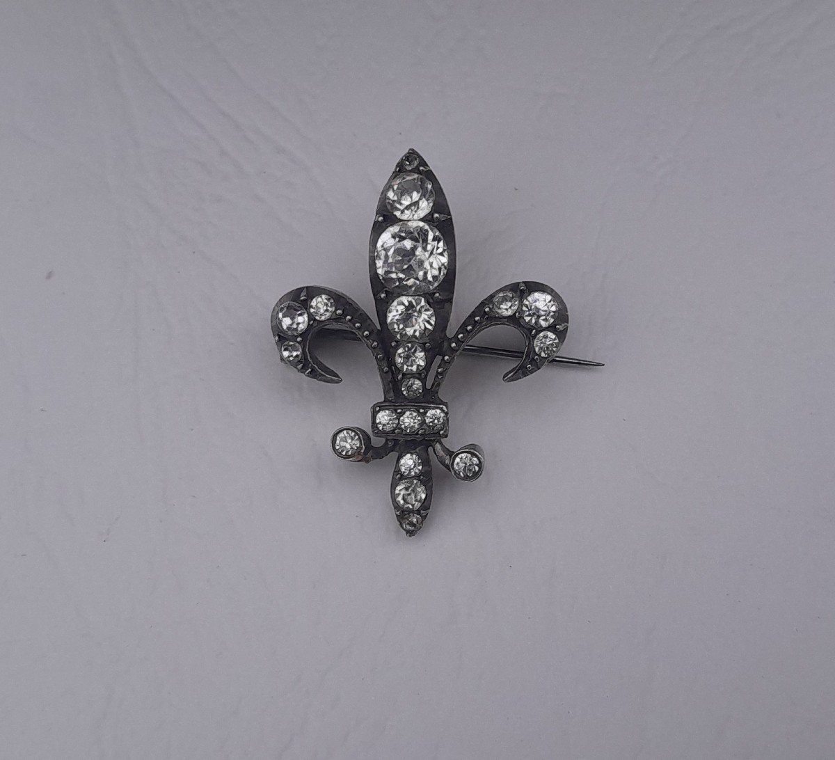 Fleur De Lys Brooch In Silver And Rhinestones