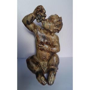 Large Royal Copenhagen Stoneware Faun With A Bunch Of Grapes  By Knud Kyhn (1880-1969)