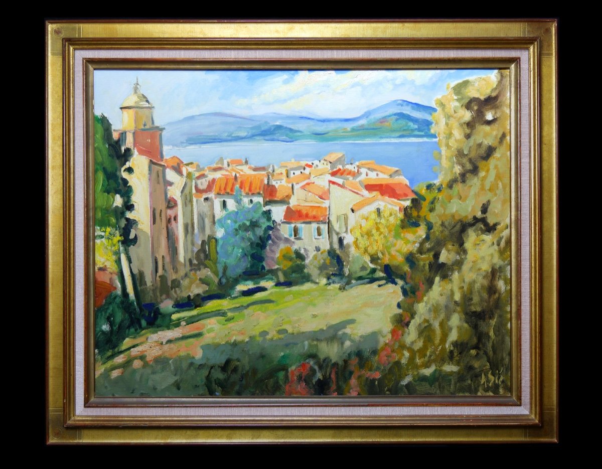 Grande peinture représentant une vue du village  de  Saint-Tropez par le peintre Henri Sié