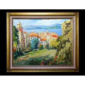 Grande peinture représentant une vue du village  de  Saint-Tropez par le peintre Henri Sié