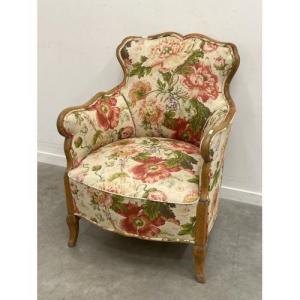 Old Armchair Covered With Fabric With Flowers