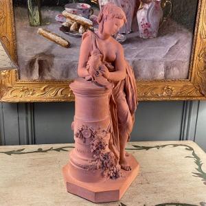 Statue Of A Young Woman With A Bird, Terracotta