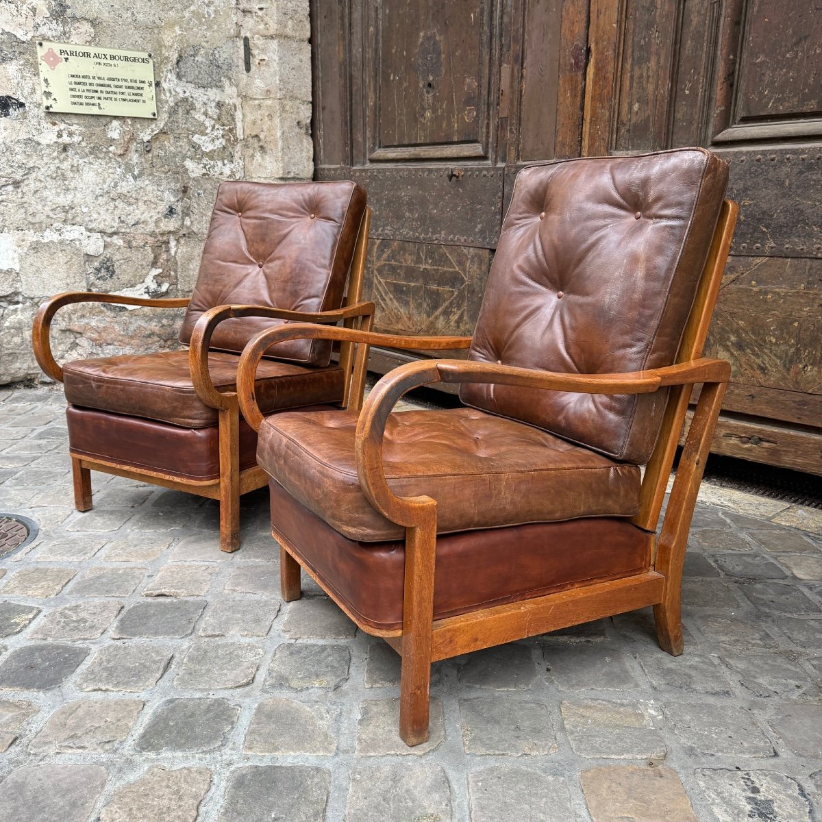 Pair Of Leather Armchairs