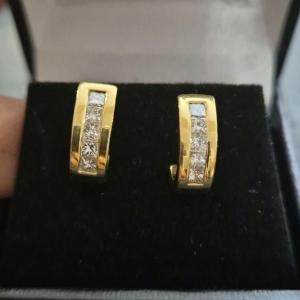 A Pair Of Princess Diamond Earrings