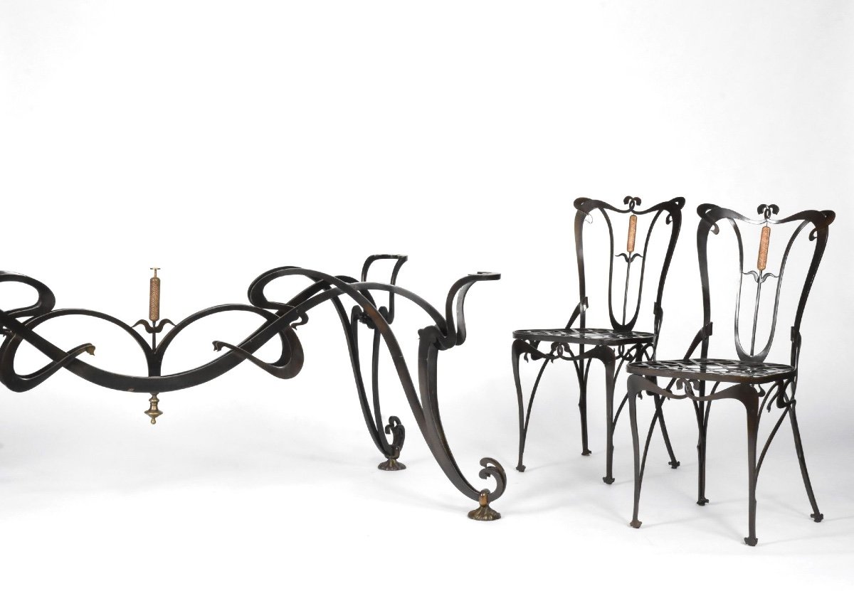 Art Nouveau Dining Table And Ten Chairs In Black And Gold Lacquered Cast Iron