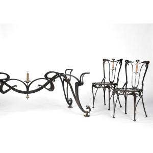 Art Nouveau Dining Table And Ten Chairs In Black And Gold Lacquered Cast Iron