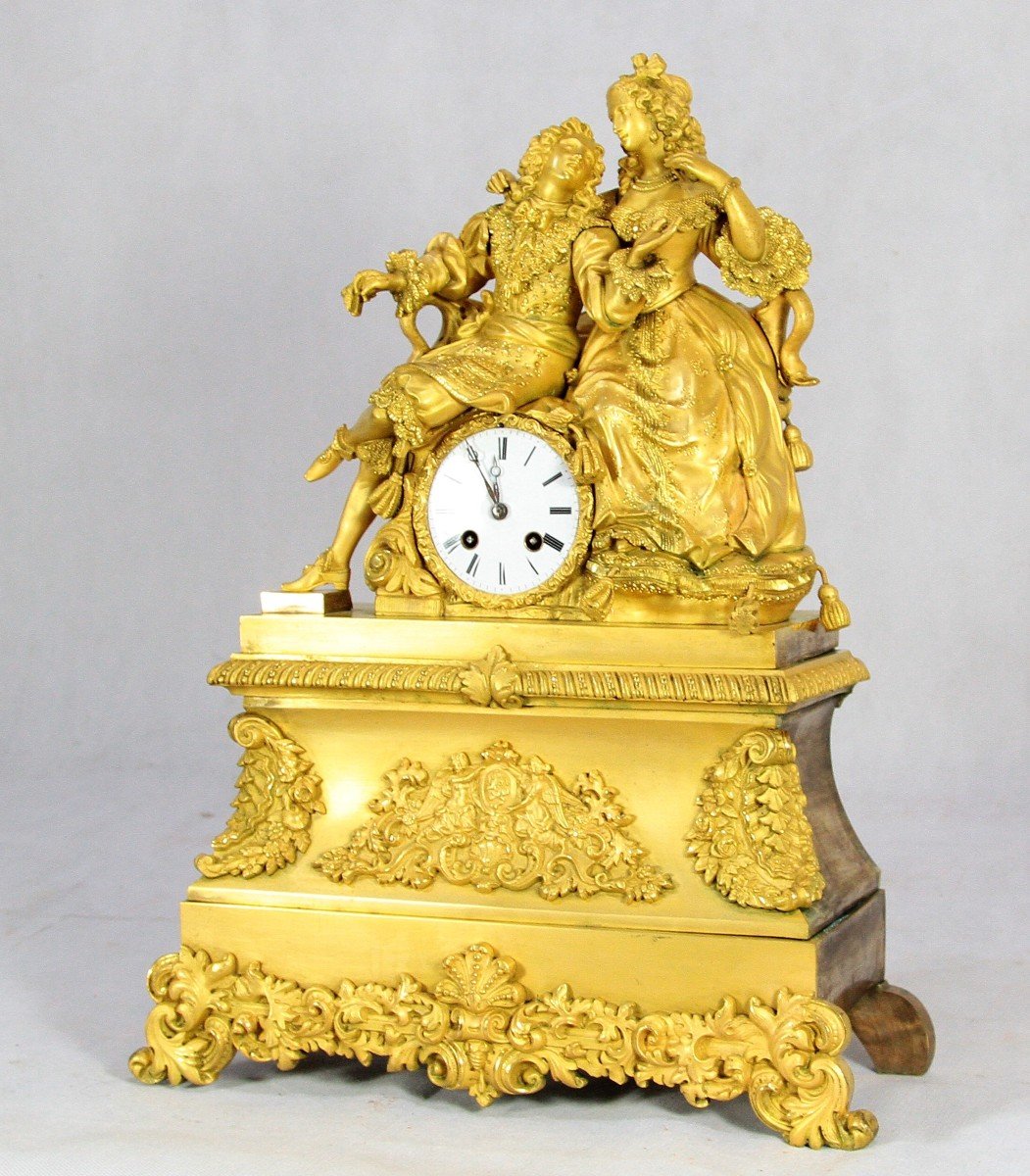 Pendule bronze doré " Louis XIV et une courtisane", XIXe