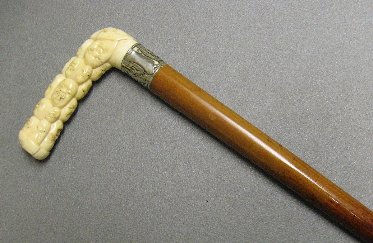 Cane With Carved Handle Decorated With Japanese Noh Theater Masks, 19th Century.