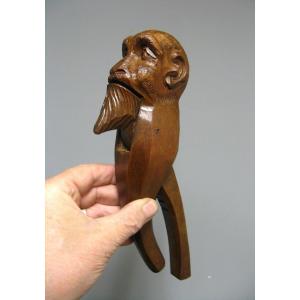 Nineteenth Carved Wood Nutcracker. Bearded Monkey Head Cartoon.