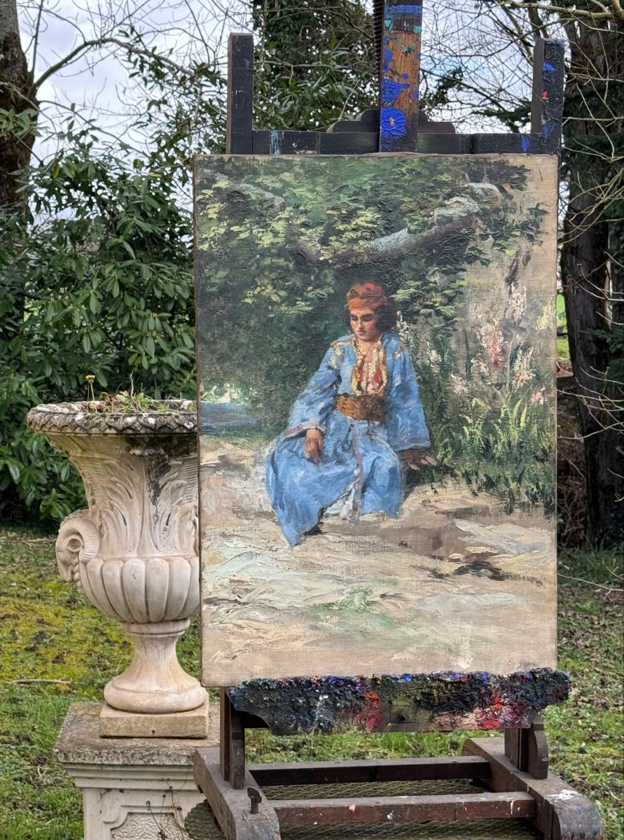 Young Oriental Woman Under A Tree 