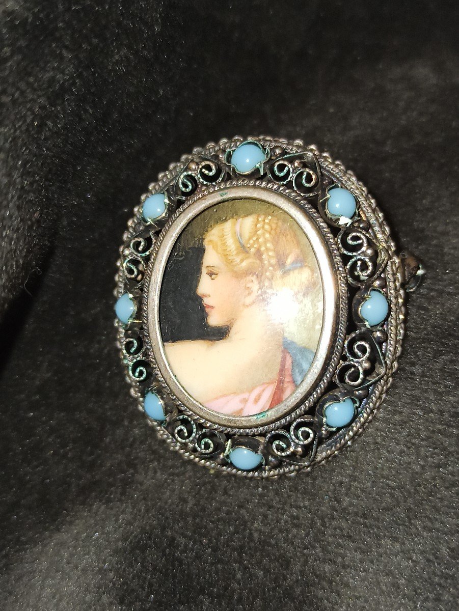 Silver Brooch Decorated With A Painted Miniature In A Surrounding Of Blue Pearls