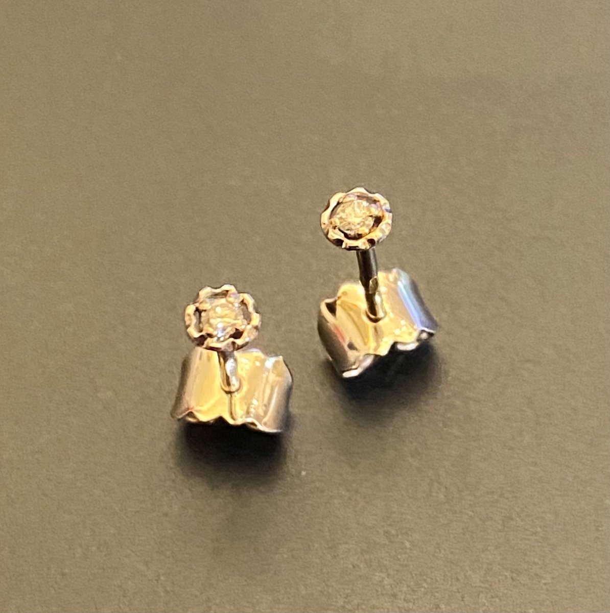 Pair Of Gold And Diamond Stud Earrings-photo-2