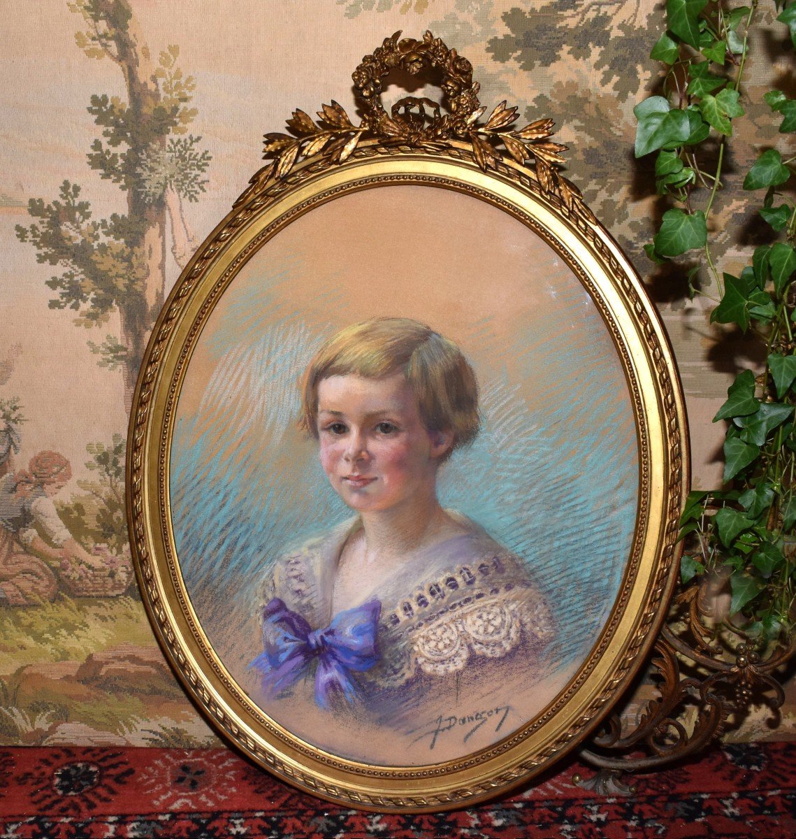 Pastel, Portrait Of A Young Child, Jeanne Dangon 1873-1949. Louis XVI Oval Gilded Frame And Bow