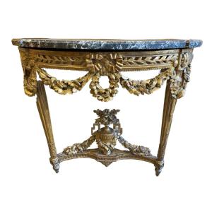 Console d’époque Louis XVI en bois sculptée et doré de forme demie lune