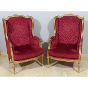 Pair Of Louis XVI Gilded Wood Bergeres With Ears, Covered In Red Embossed Velvet, 19th Century