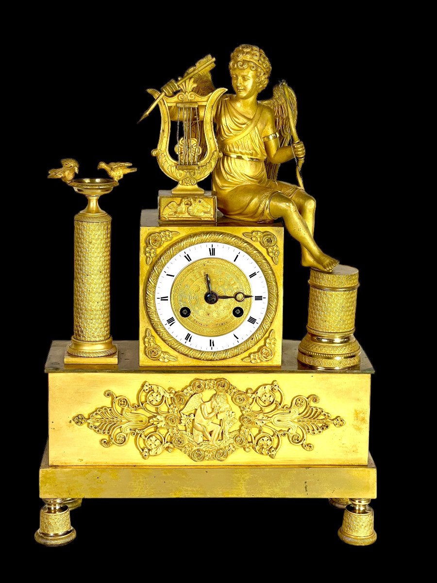 Empire Period Clock In Gilt Bronze Decorated With Eros Playing The Harp