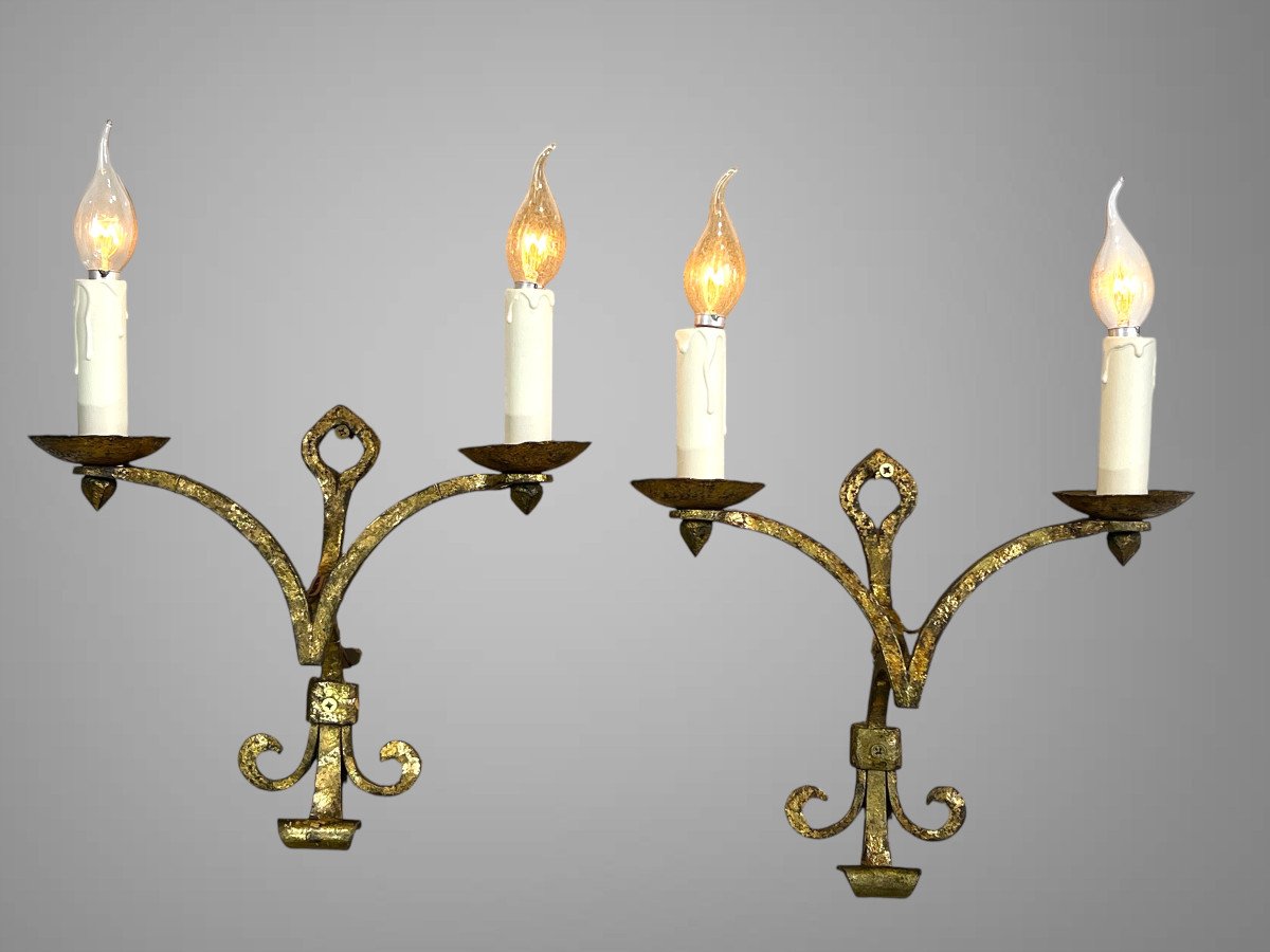 Pair Of Wall Lights By Robert And Roger Thibier 20th Century In Hammered And Gilded Iron