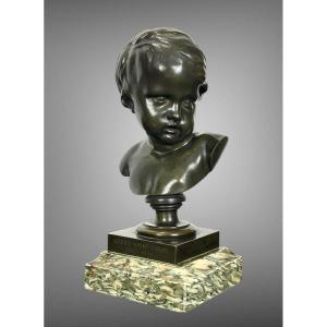 Bust Of A Putto In Patinated Bronze After Francois Duquesnoy On Marble Base