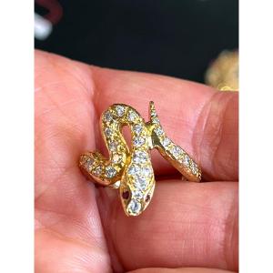 Snake Ring In Gold And Diamonds.