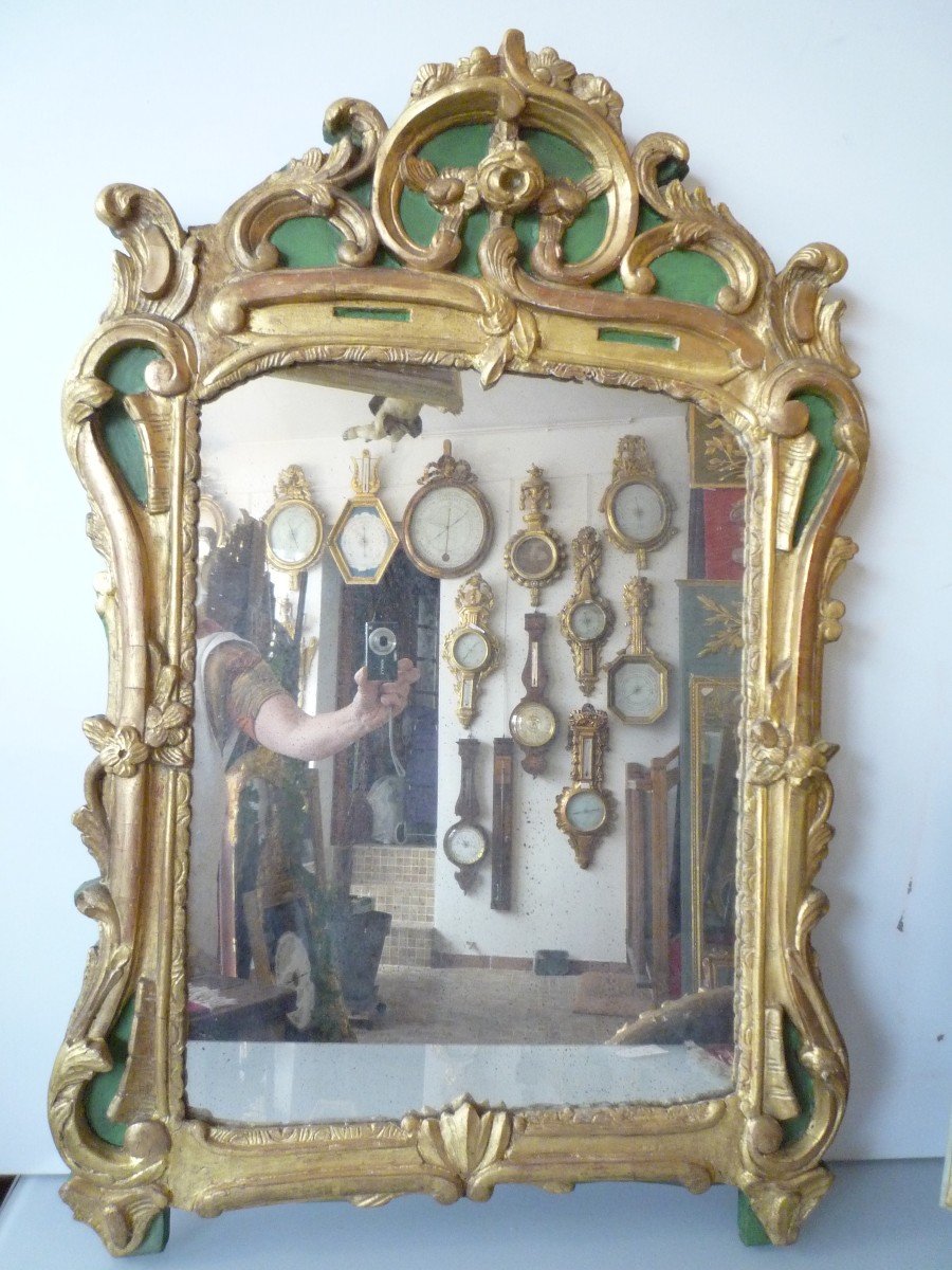 Louis XV Period Mirror In Carved And Gilded Wood