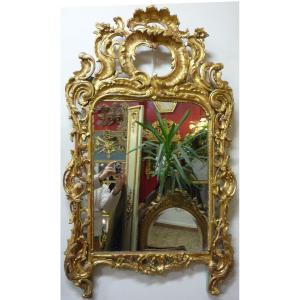 Miroir à parcloses d'époque Louis XV en bois sculpté doré