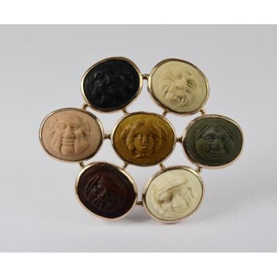 14k Gold Brooch Adorned With Seven Lava Stone Cameos
