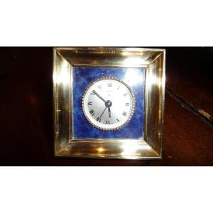 Cartier. Small Cartier 8 Day Travel Alarm Clock In Gilded Brass And Lapis Lazuli 1960s.