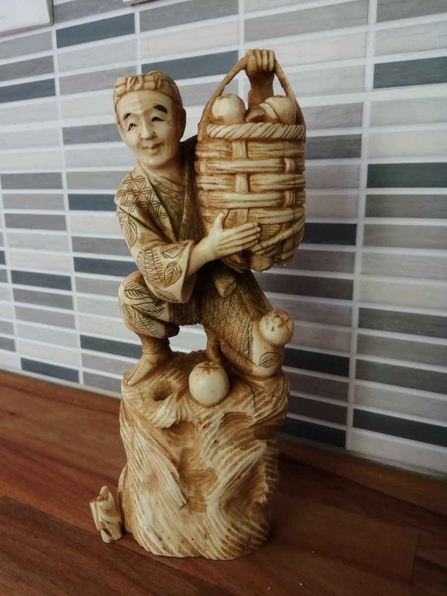 Ivory Sculpture Man With Fruit Basket