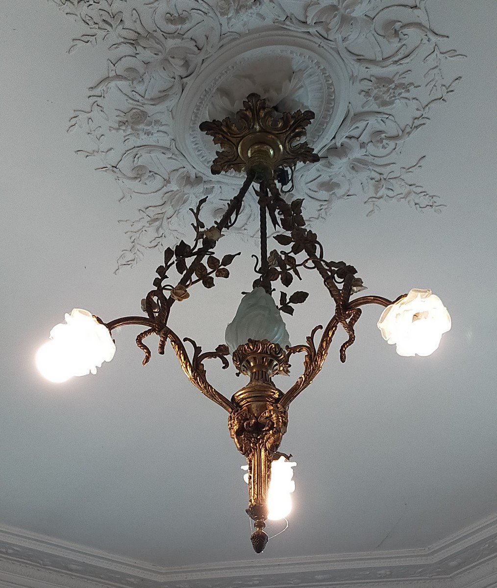 Bronze Chandelier Floral Decor And Rams Heads