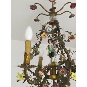 Chandelier Cage Decor Of Porcelain Flowers And Character