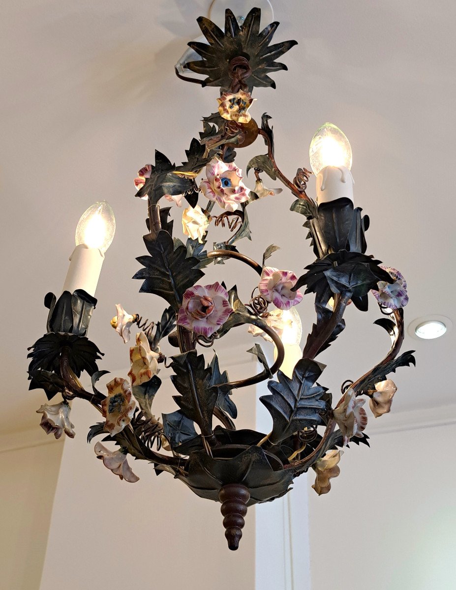 Cage Chandelier Decorated With Branches And Flowers