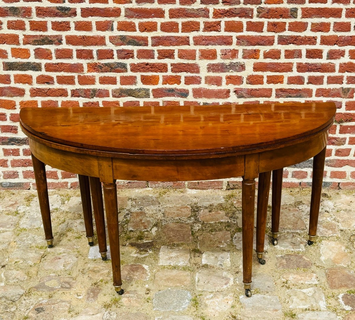 table demi lune 8 pieds en acajou d’époque Louis XVI 