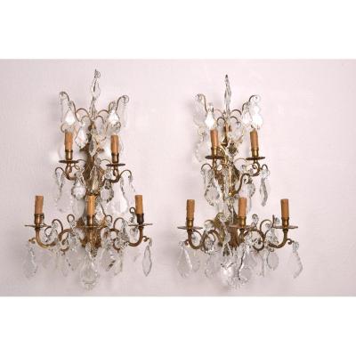 Imposing Pair Of Bronze And Crystal Sconces.