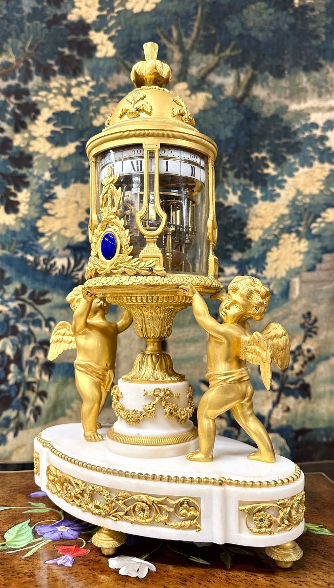 Rare Pendule en bronze doré à Cercles Tournants De Style Louis XVI. époque Napoléon III-photo-3