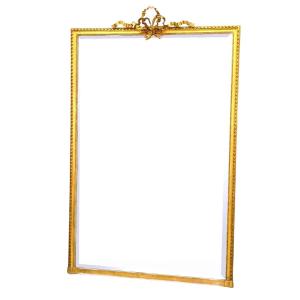 Large Louis XVI Style Gilded Wood And Stucco Mirror With Beveled Glass, 19th Century 