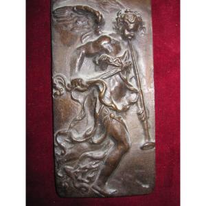 Eighteenth Century Bronze Plaque. Angel With Trumpet. 10.5 X 5.2 Centimeters