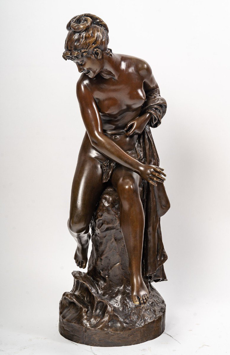 Sculpture Representing A Woman Sitting On A Rock By Léon Pilet