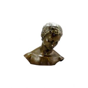 Sculpture Of A Face With An Inclined Head In Patinated Bronze, Contemporary Art, 21st Century.